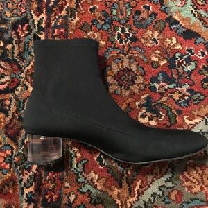 Black sock boots with a clear heel!